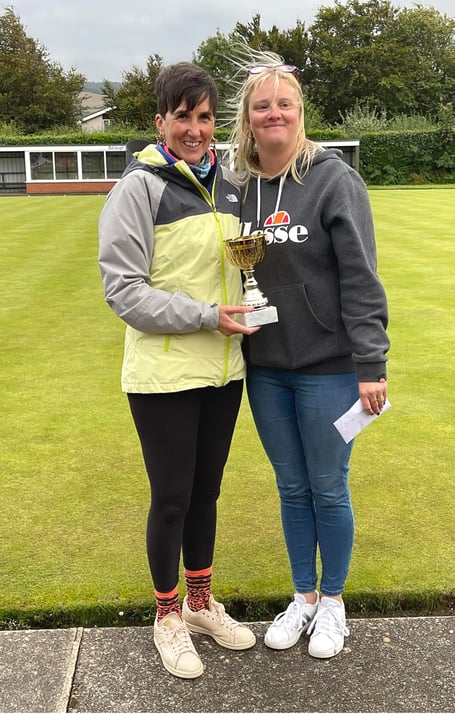 Dave McTaggart Memorial Trophy winners Rebecca Teare (right) and Louise Tebay with the silverware (Photo: Clare Cooper)