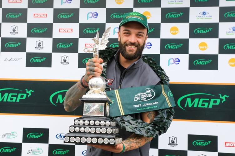 Andrea Majola with the MGP Supporters Club Junior Manx Grand Prix trophy last year (Photo: Callum Staley/CJS Photography)