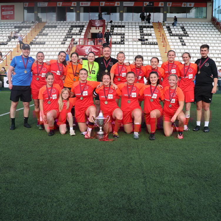 The Isle of Man national women's football team with the Cherry Godfrey Cup after beating Jersey in Saturday's final (Photo: Paul Hatton)