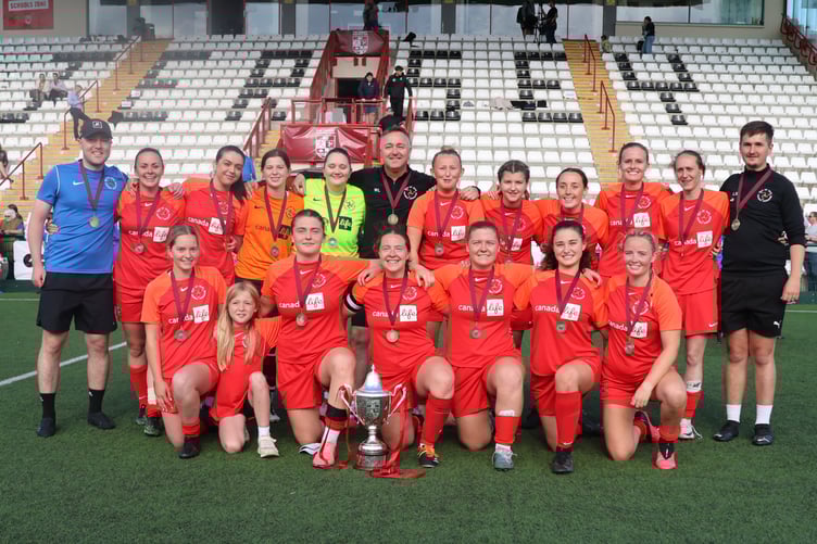 The Isle of Man national women's football team with the Cherry Godfrey Cup after beating Jersey in Saturday's final (Photo: Paul Hatton)
