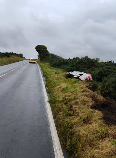 A car ended up in a ditch after a crash on the Mountain Road