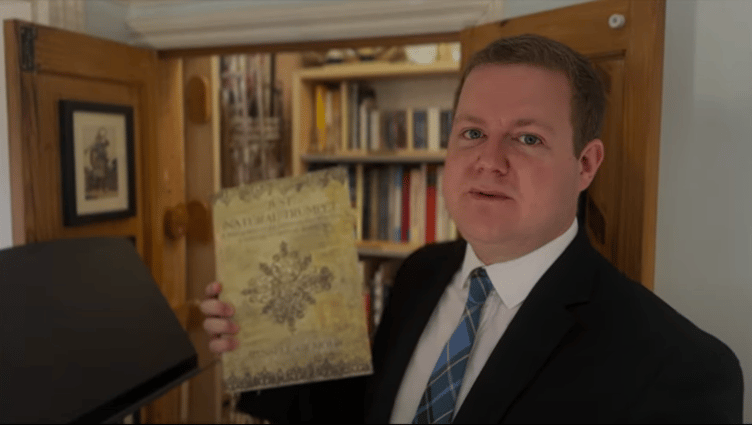 Russel Gilmour with his book 'Just Natural Trumpet'