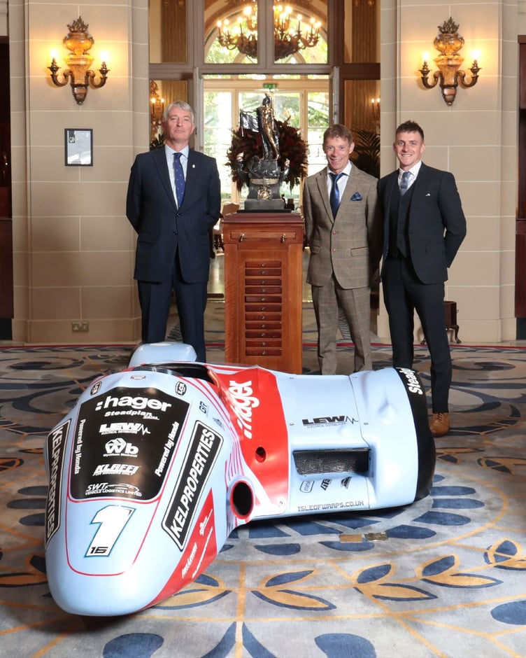 Ben and Tom Birchall have been awarded the Royal Automobile Club’s Seagrave Trophy. The sidecar pair are pictured with RAC Chairman Duncan Wiltshire