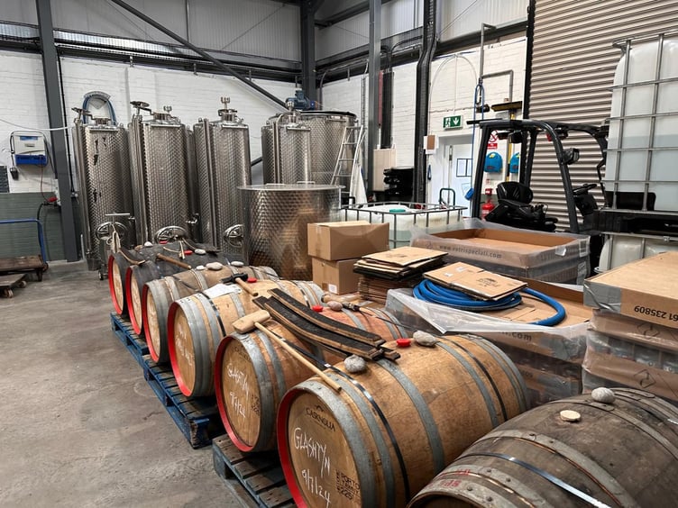 More barrels and equipment within the Distillery