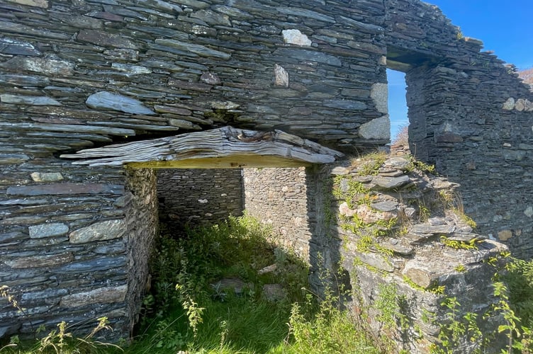 Wooden beam still in place at an abandoned farm at Glen Rushen