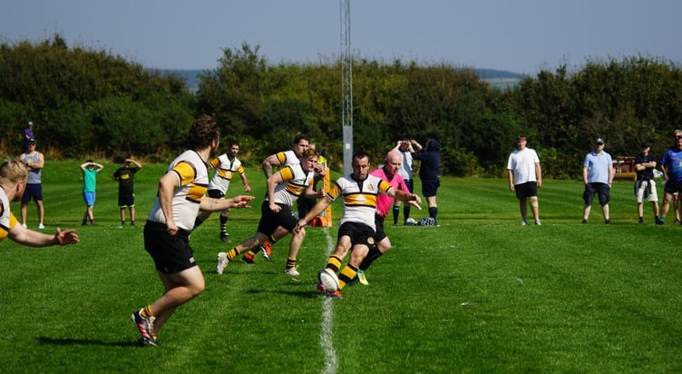 Dan Bonwick kicks off for Vagabonds against Ormskirk at Ballafletcher on Saturday (Photo: John Liver)