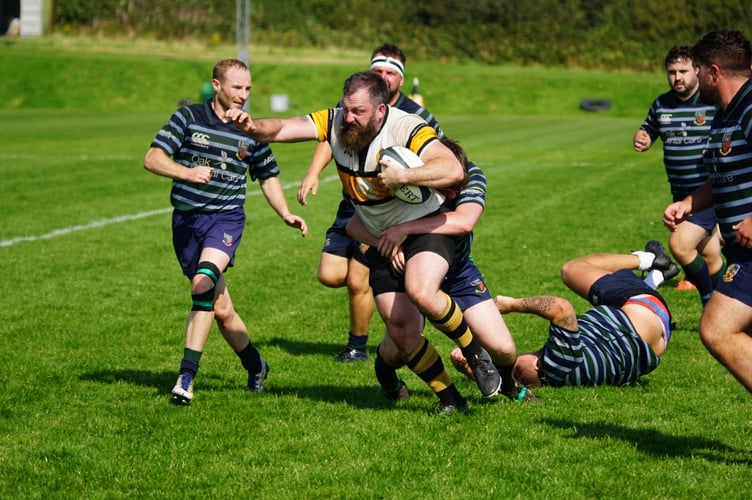 The new rugby season began on Saturday with both Vagabonds and Douglas in action. Instead of the usual mud and cold, Vagas players like Jon Ferguson pictured above had to deal with blazing sun and high temperatures. Visitors Ormskirk adjusted to the conditions the best, winning the match at Ballafletcher 31-13. Report on page 44 (Photo: John Liver)