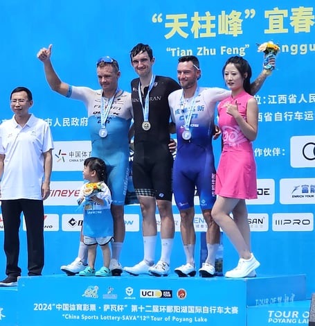 Isle of Man cyclist Tylar Hannay (black jersey) on the top step of the podium after winning stage six of the Tour of Poyang Lake