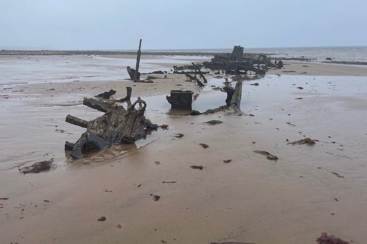 The shipwreck at Jurby beach much of which has sunk into the sand