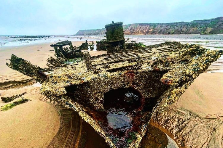 Barnacles encrust the shipwreck at Jurby beach