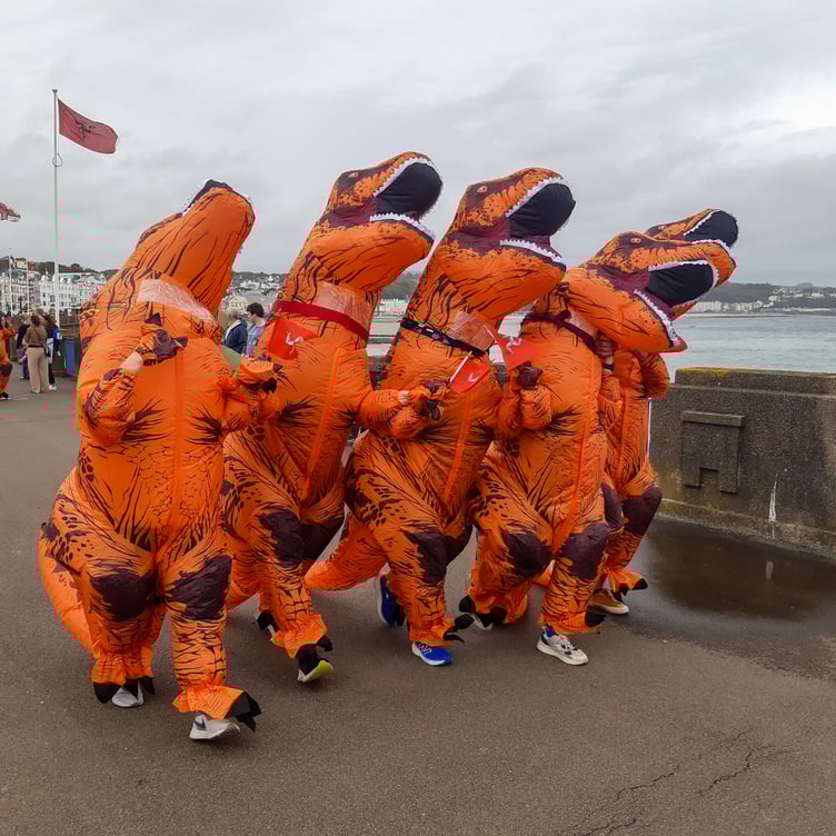 More than 500 runners took to Douglas Promenade in inflatable T-Rex outfits on Saturday afternoon