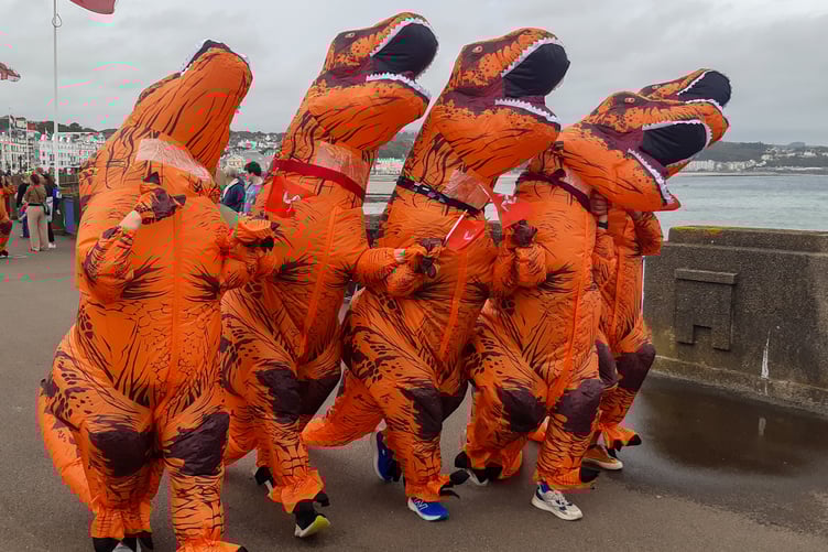 More than 500 runners took to Douglas Promenade in inflatable T-Rex outfits on Saturday afternoon