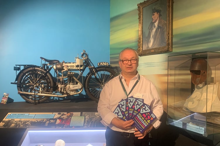 Manx National Heritage's Daniele Tortasso showcases the heritage open days brochures for 2024
