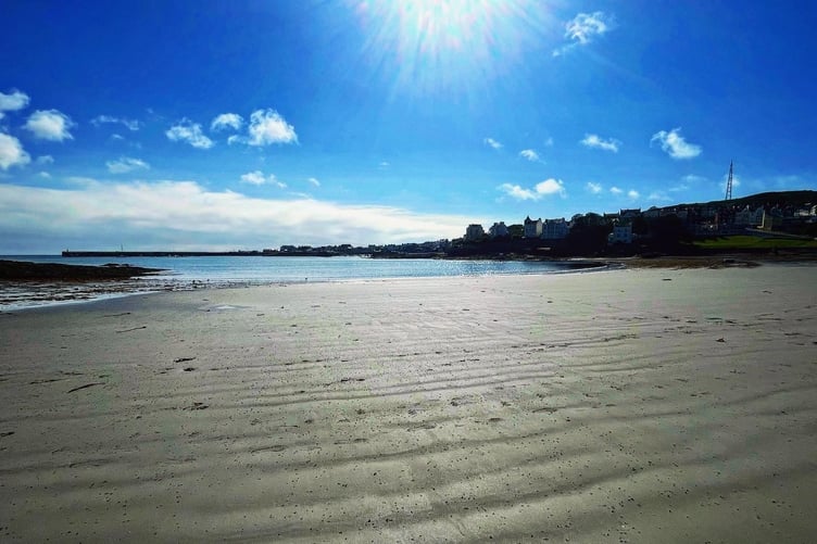 Sunny day on Port St Mary beach