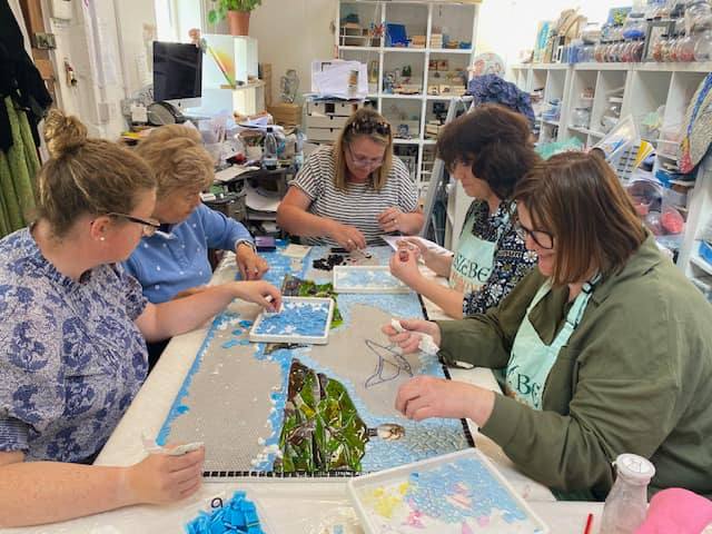 Volunteers helping out with the mosaic