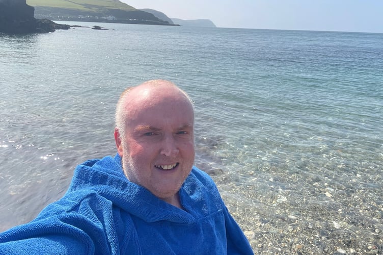 Reporter James Campbell after going for a swim at Spaldrick beach