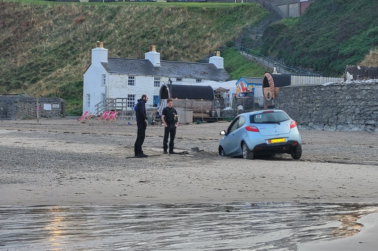 The car became stuck in the sand near the Cosy Nook cafe