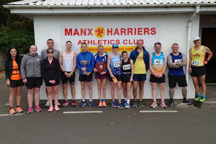 Winners Ollie Lockley and Sarah Webster with some of the other competitors at Sunday's Peel to Douglas run