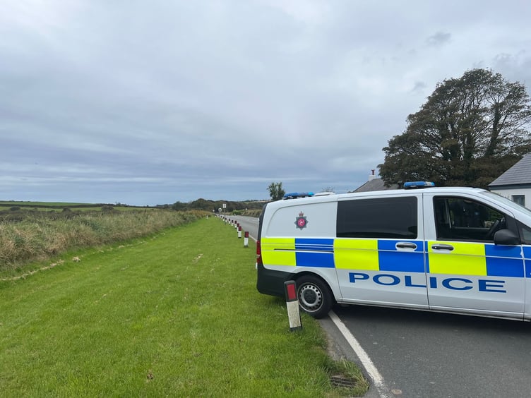 Police have closed the road at the Braaid