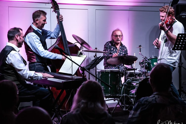 John Coghlan (second right) performing in his quartet