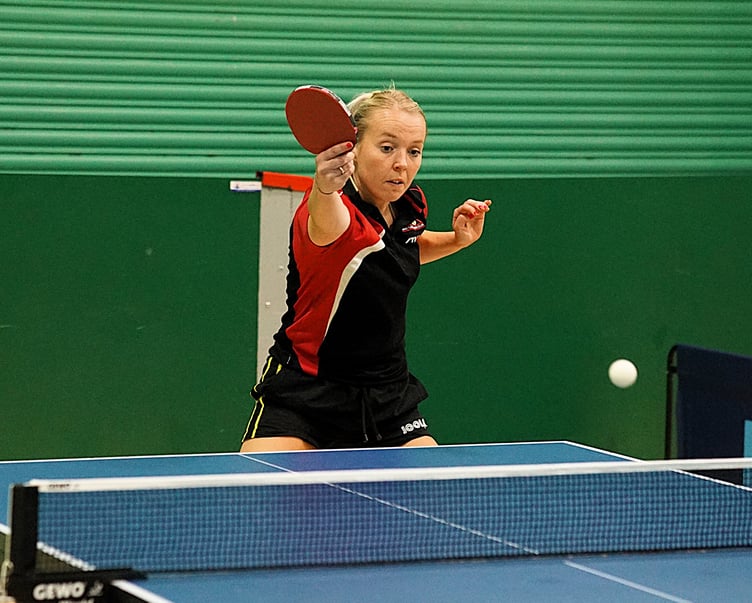 Becky Taylor plays a winning backhand on her way to three victories last week for Ramsey A (Photo: Malcolm Lambert)