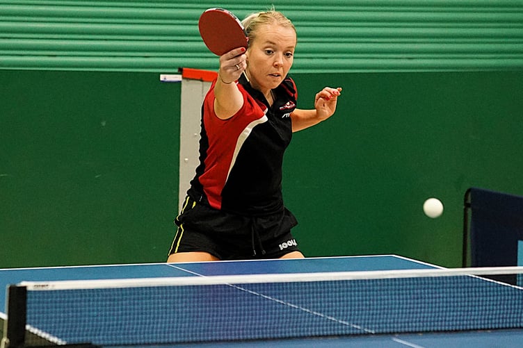 Becky Taylor plays a winning backhand on her way to three victories last week for Ramsey A (Photo: Malcolm Lambert)