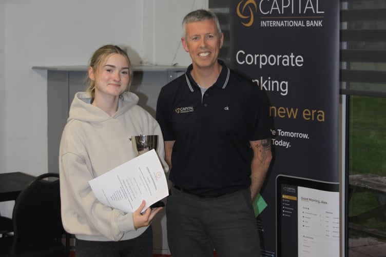 Shannon Saunders with Steven Quayle from sponsor Capital International Bank