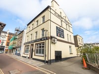 Man lunged at pub official before punching him three times in the head