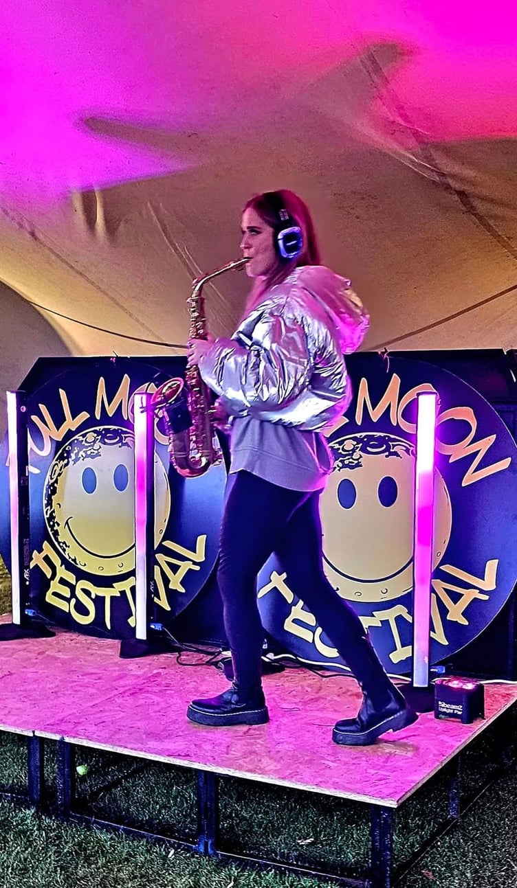 'Sammy J' plays the saxophone