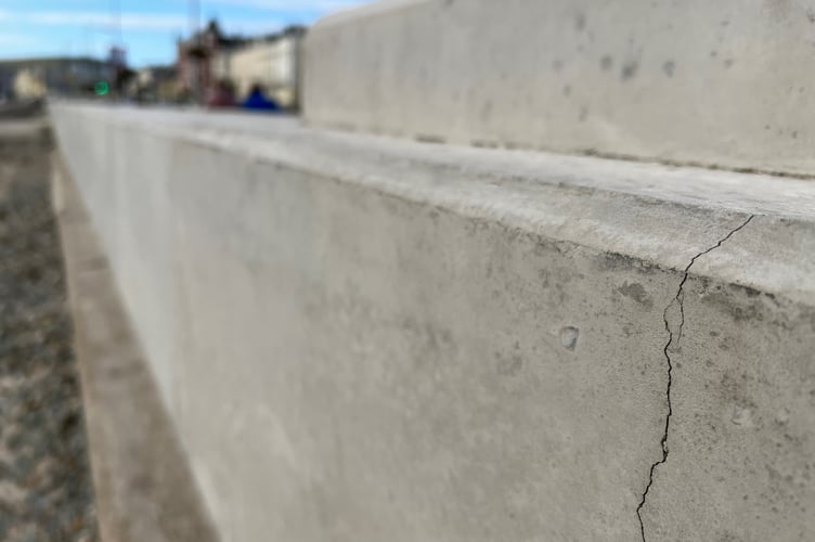 Cracks on another section of the sea wall