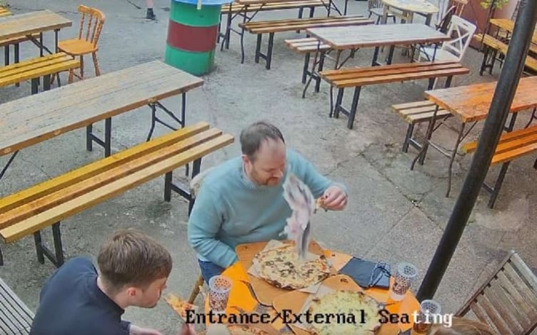 The moment a seagull dropped a fish onto a table at Black Dog Oven in Peel