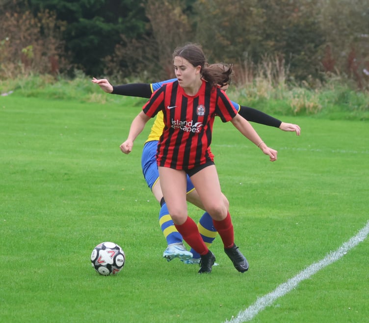 Malew's Rosabel Cardy in action against Onchan scored twice in a 6-2 win over the Os on Sunday (Photo: Paul Hatton)