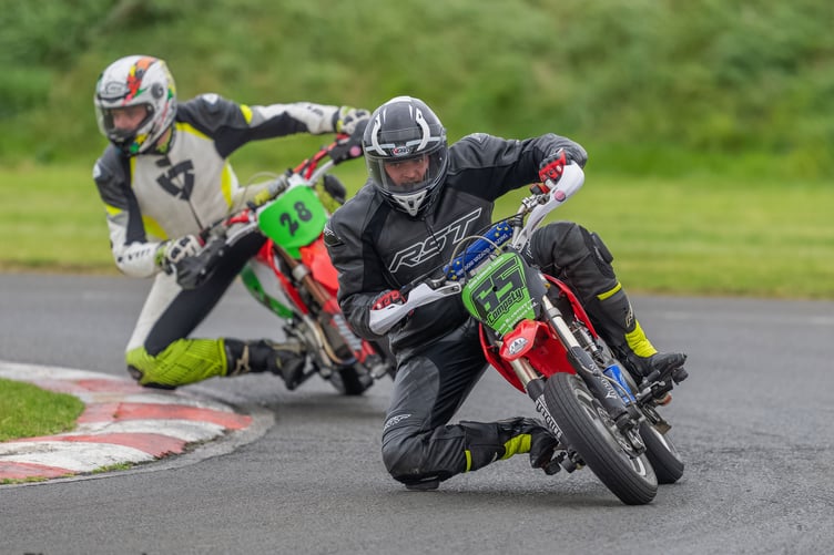 Senior pitbike champion Scott Compsty (No.65) fending off Jack Haybyrne on his way to retaining his title (Photo: Hagar Photography)