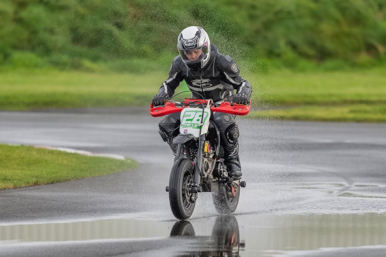 Conor Percival aboard his junior pitbike ploughing through tricky conditions at the JCK Kart Track last weekend (Photo: Hagar Photography)
