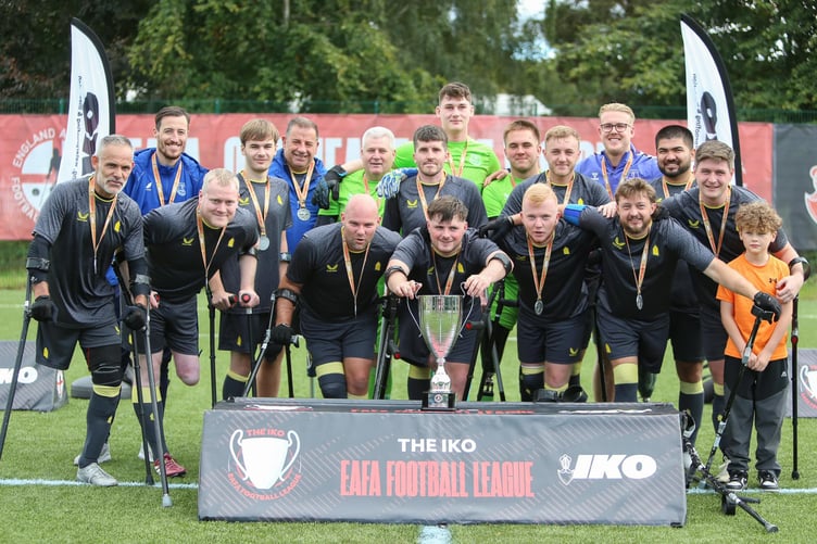 Isle of Man amputee footballer Sean Jackson (sixth from right) celebrates with his Everton team-mates after winning the IKO England Amputee Football League title (Photo: Three Lines Photography)
