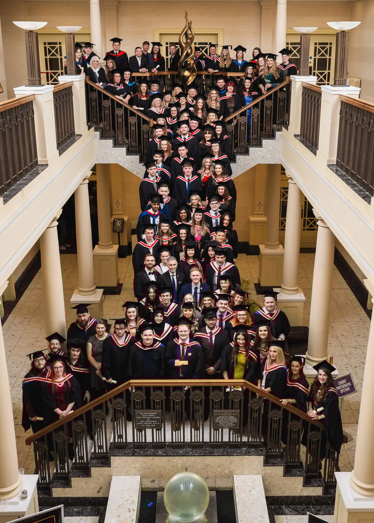 Graduates group photo at the Villa Marina