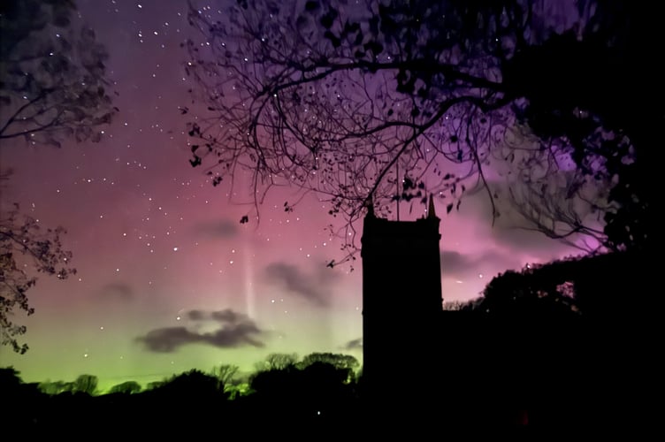 Heavenly lights behind Arbory church