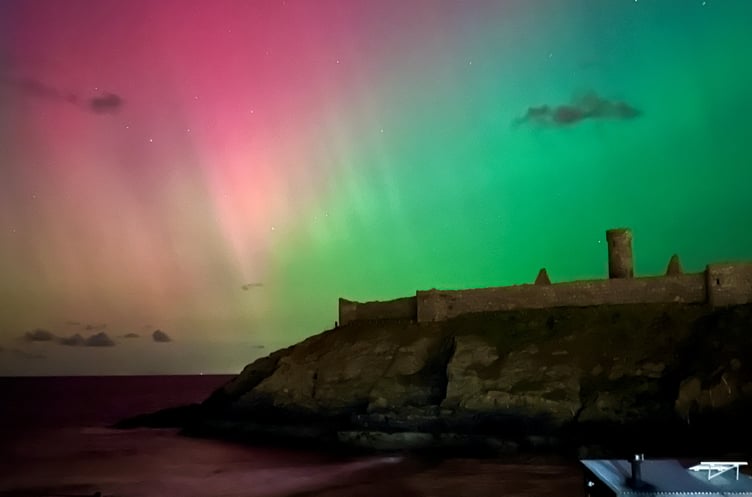 Peel Castle gets a colourful backdrop