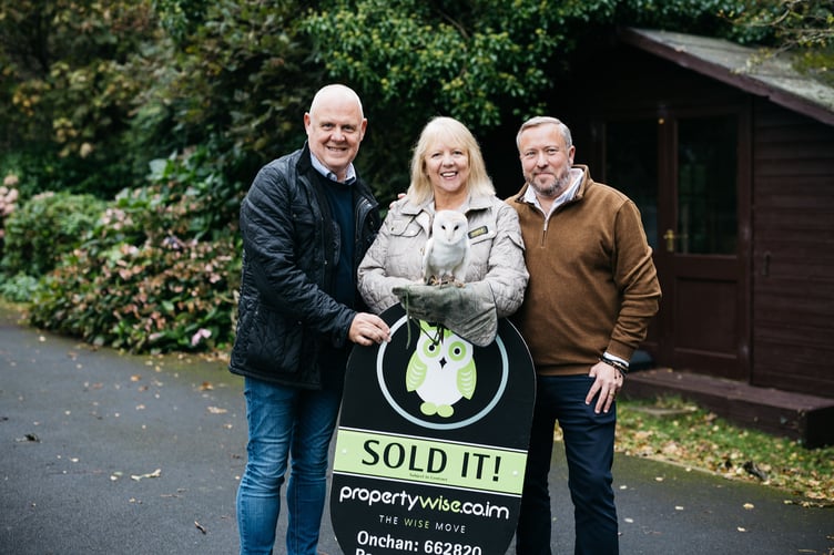 (from left) Tony Weston and Lorna Fairclough of Property Wise with Brendan Beeken of Partners Real Estate at the Curraghs Wildlife Park. A donation has been made by Partners to assist with the care of the park’s owls to mark the acquisition of Property Wise