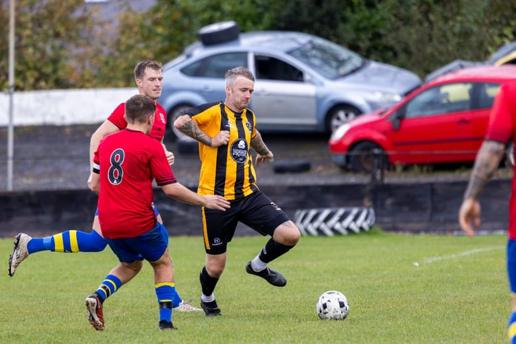 Steven Harris (right) impressed in defence against Onchan to earn his place in the latest Team of the Week (Photo: Gary Weightman)