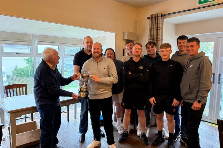 The Crosby Cricket Club A-team presented with the Tinker Cup by Club President David Creer