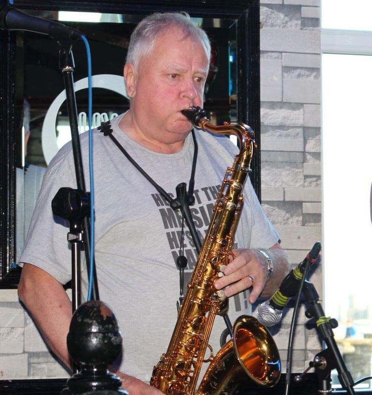 Jerry Carter playing the saxophone