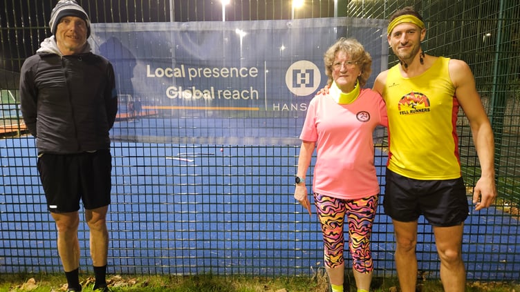Sue Ackroyd won the autumn 5km walk from runner-up Gianni Epifani (left) and Stu Osborne (right)