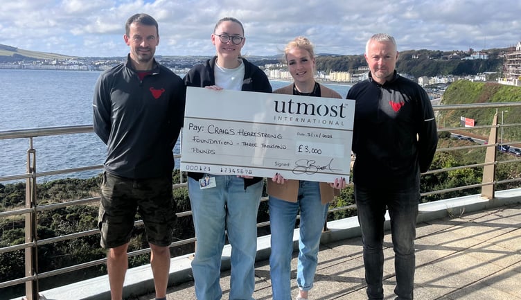 Craig's Heartstrong Foundation's John Coppell and Chris Feeney (right) with Utmost International employees Ruby Hughes and Sophie Cowin