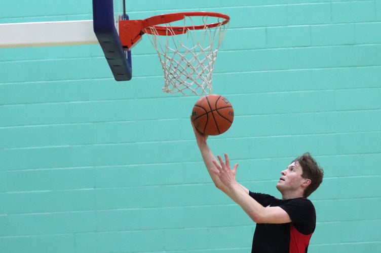 Matthew Jones goes on the fast break lay-up for Ravens in their clash against Wolves last Thursday (Photo: Oliver Hamilton)