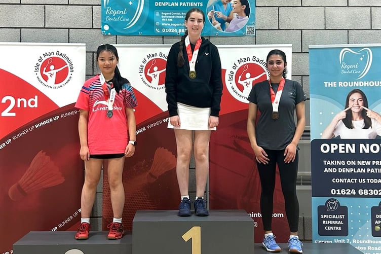 Kelly Domingo successfully defended her girls singles title ahead of runner-up Kelly Cheung and Fatima Syed