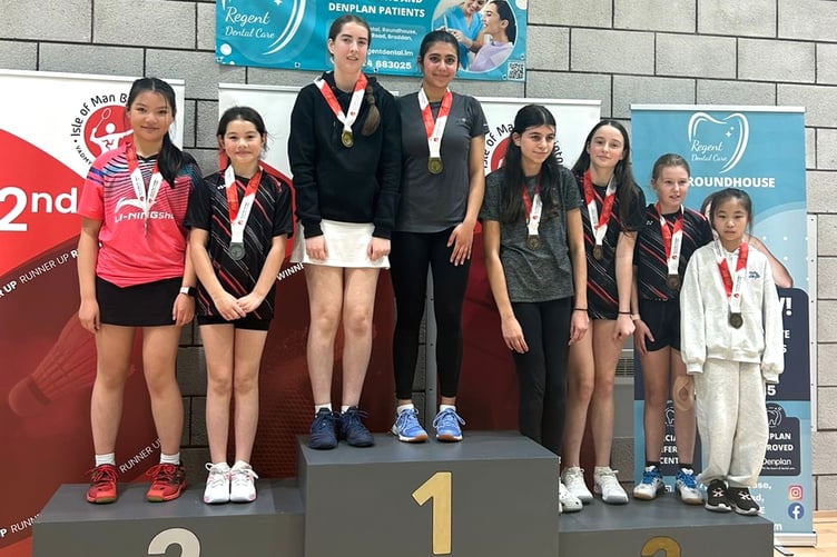 Kelly Domingo and Fatima Syed on the top step of the podium in the girls doubles competition, alongside runners-up Kelly Cheung and Connie Creer plus bronze medallists  Lara Stewart/Sophie Clague and Charlotte Quayle/Sky Yin