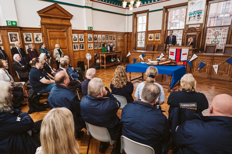 Douglas City Hall was busy as the 'Connecting our Communities' scroll was signed