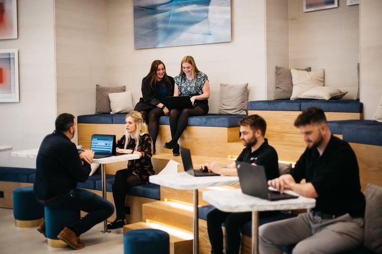 Staff in the auditorium at Plan.com HQ in Douglas