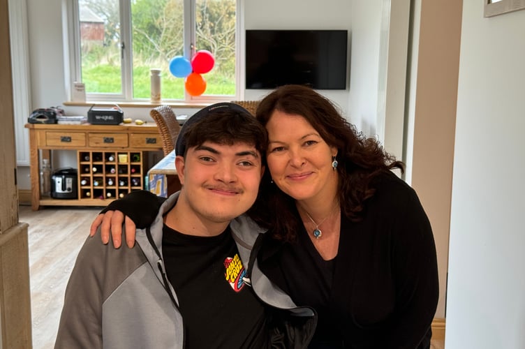 Lockie Kirk is back with his family. Here he is pictured with his mum Lauren